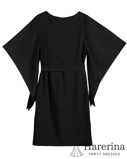 ブラックのフレアスリーブ×ウエストリボン風デザインワンピース背面を平置きで撮影した画像。後ろのシルエットが分かる写真。
