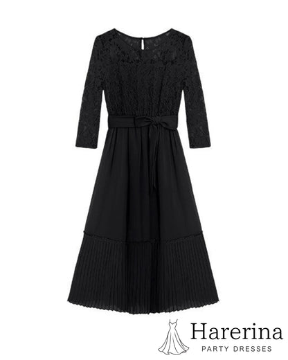 ブラックのレースシフォンドレスを平置きで撮影した正面全体イメージ。シンプルでシックなデザインが際立つ構図
